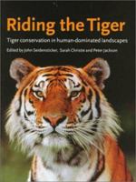 Riding the Tiger: Tiger Conservation in Human-Dominated Landscapes 0521648351 Book Cover
