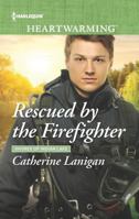 Rescued by the Firefighter 133563388X Book Cover