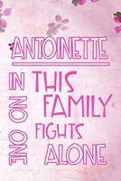 ANTOINETTE In This Family No One Fights Alone: Personalized Name Notebook/Journal Gift For Women Fighting Health Issues. Illness Survivor / Fighter Gift for the Warrior in your life Writing Poetry, Di 1704119359 Book Cover