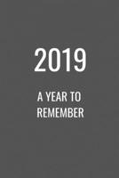 2019:  A Year to Remember: A Weekly Planner/ Scrapbook Use as a Gift or For Yourself, a Place to Put Things Like Ticket Stubs, Photos, and Written Memories to Commemorate the Year 1699025215 Book Cover