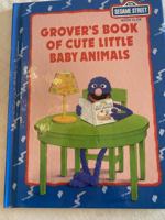 Grover's Book of Cute Little Baby Animals: Featuring Jim Henson's Sesame Street Muppets 0895777029 Book Cover