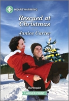 Rescued at Christmas: A Clean and Uplifting Romance 1335051325 Book Cover