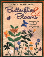 Butterflies and Blooms: Designs for Applique and Quilting 1571201378 Book Cover