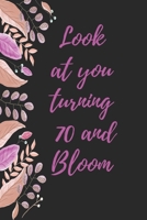 look at you turning 70 and bloom: Notebook birthday gift to celebrate 70th 1678519316 Book Cover
