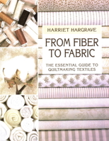 From Fiber to Fabric: The Essential Guide to Quiltmaking Textiles 1571200258 Book Cover
