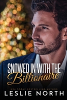 Snowed in with the Billionaire 1739158849 Book Cover