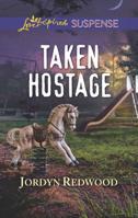 Taken Hostage 0373457324 Book Cover