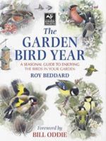 The Garden Bird Year: A Seasonal Guide to Attracting Birds to Your Garden 1859746551 Book Cover