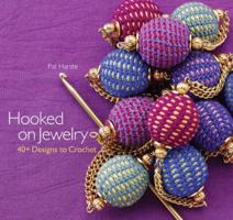 Hooked on Jewelry: 40+ Designs to Crochet 1933027770 Book Cover