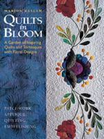 Quilts in Bloom: A Garden of Inspiring Quilts and Techniques with Floral Designs 1589231333 Book Cover