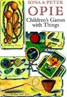 Children's Games with Things: Marbles, Fivestones, Throwing and Catching, Gambling, Hopscotch, Chucking and Pitching, Ball-Bouncing, Skipping, Tops and Tipcat 0192159631 Book Cover