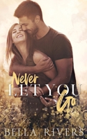 Never Let You Go: A Small Town Single Dad Romance (Emerald Creek) 1962627128 Book Cover