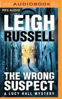 The Wrong Suspect 1611099439 Book Cover