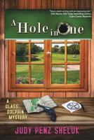 A Hole In One: A Glass Dolphin Mystery 1941295738 Book Cover