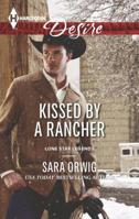 Kissed by a Rancher 0373733860 Book Cover
