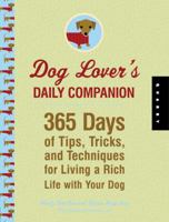 The Dog Owner's Devotional: 365 Days of Tips, Tricks, and Techniques for Living a Rich Life with Your Dog 1592535283 Book Cover