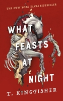 What Feasts at Night 1250830850 Book Cover